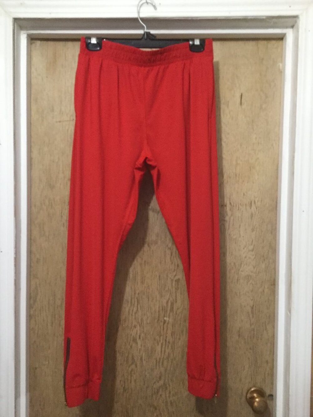 Zyia active red jogging pant with zip detail at the bottom size medium 27 inseam